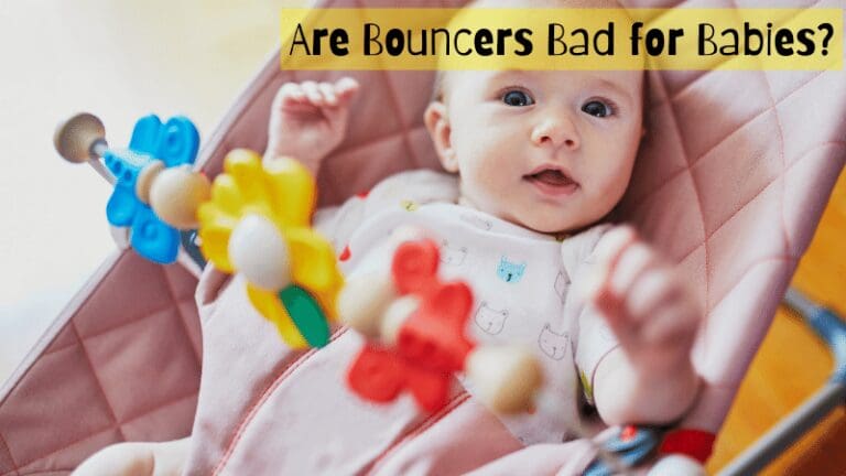 Are-bouncers-bad-for-babies-with-cute-kid-smiling-while-sitting-in-bouncer