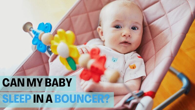cute-baby-with-eyes-wide-open-playing-on-baby-bouncer