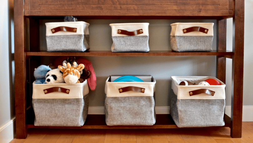 baby-toys-organized-in-cloth-storage-boxes-with-handles