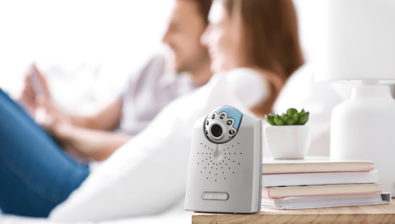 baby-monitor-camera-with-parents-in-the-background
