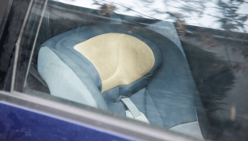 infant-car-seat-seen-from-the-window-of-a-car