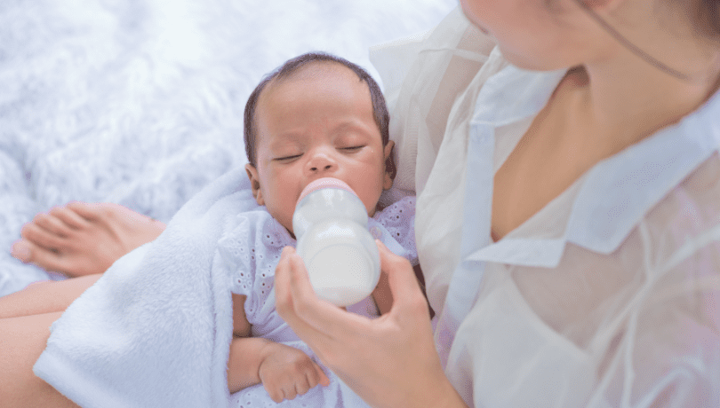 mother-bottle-feeding-asian-newborn-baby