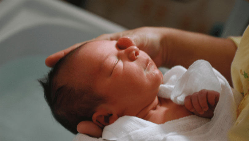 newborn-baby-getting-a-bath