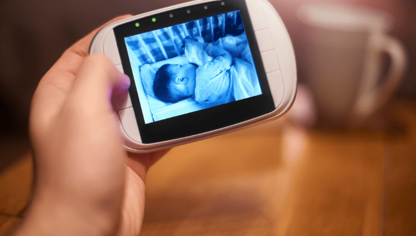 baby-monitor-showing-baby-sleeping-in-their-bed