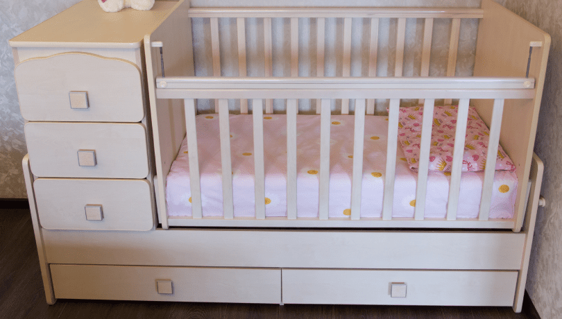 beige-crib-and-mattress-with-changing-table-and-drawers