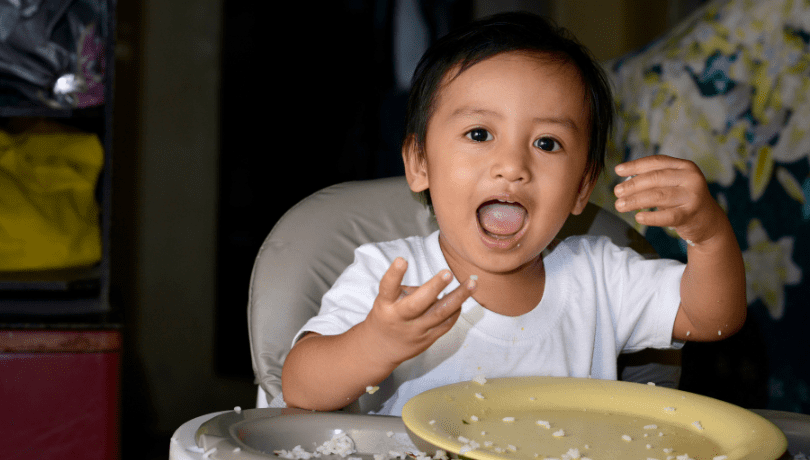 1-year-old-boy-learning-to-eat