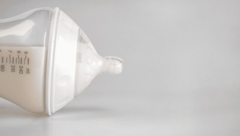 wide-neck-baby-bottle-filled-with-milk