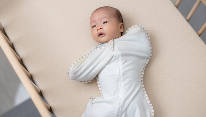 adorable-baby-swaddled-in-a-sleep-sack