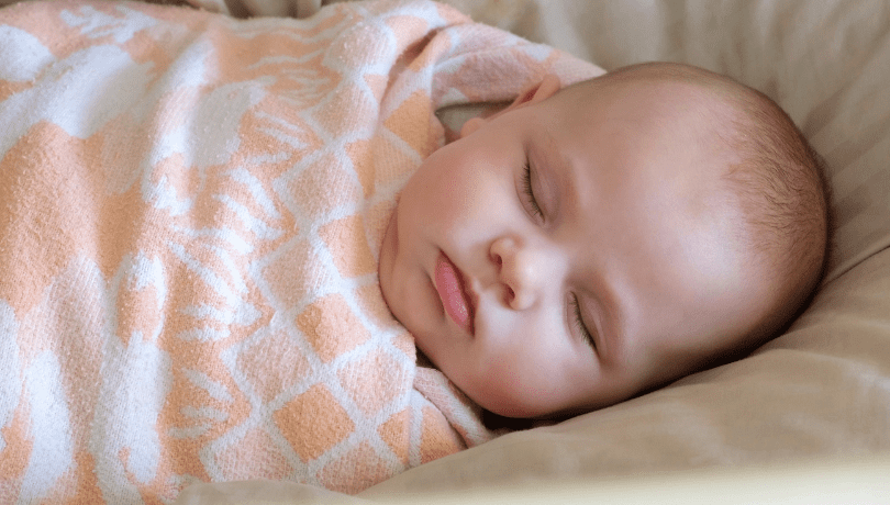 baby-sleeping-soundly-in-a-cotton-swaddle